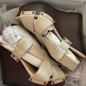 Brand New, Never Worn, 7.5 sandal wedges.